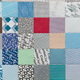 Illustration for article titled You'd Never Guess These Quilts Are Made From 1000s of Envelopes